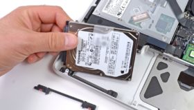 Phone and laptop displaying backup files