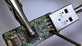 Technician recovering data from storage media